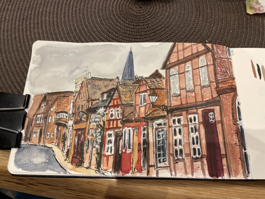 Aquarell - eine Straße in der Altstadt von Lauenburg - Fachwerkhäuser mit rotem Klinker